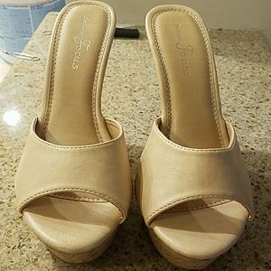 Women's size 7.5 leather platform heals